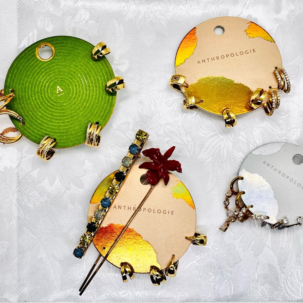 Anthropologie grouping of 14k gold plated earrings.